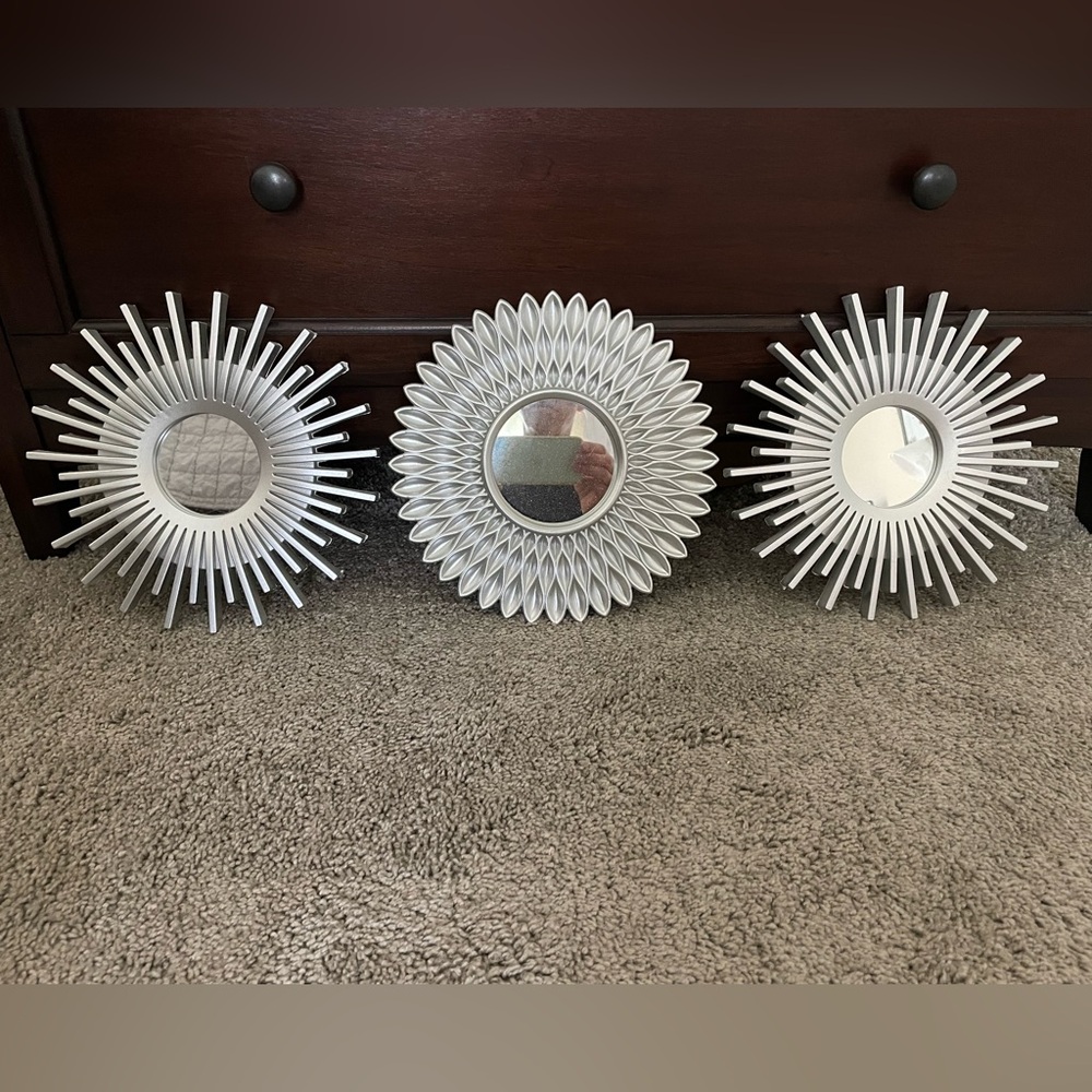 Plastic silver accent mirrors.  Really cute to add pop on wall.